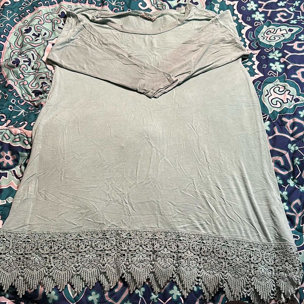 Emerald women's dress shirt. Worn twice. Medium. No rips or holes.